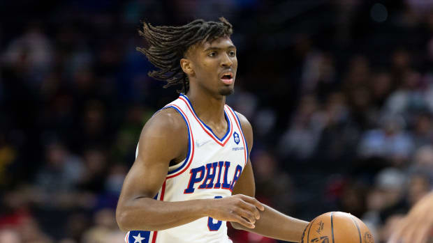 76ers guard Tyrese Maxey dribbles the ball.